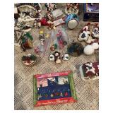 Large Collection of Christmas Decor Including Snow Village and Santa Figurines