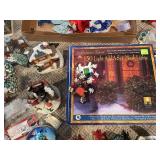 Large Collection of Christmas Decor Including Snow Village and Santa Figurines