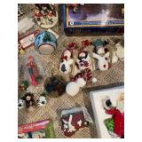 Large Collection of Christmas Decor Including Snow Village and Santa Figurines