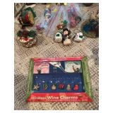 Large Collection of Christmas Decor Including Snow Village and Santa Figurines