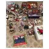 Large Collection of Christmas Decor Including Snow Village and Santa Figurines