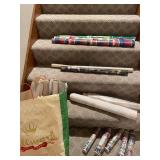 Collection of Assorted Wrapping Paper Rolls and Gift Wraps