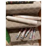 Collection of Assorted Wrapping Paper Rolls and Gift Wraps