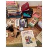 Diverse Collection of Home Decor, Books, and Accessories