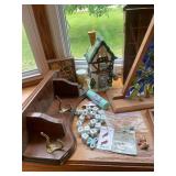 Diverse Collection of Decorative Figurines, Framed Art, and Miscellaneous Household Items