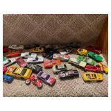 Assorted Vintage Toy Collection with Hot Wheels, Fisher Price, and Educational Toys