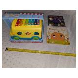 school bus toy and books