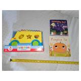 school bus toy and books