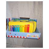 pet puppy and xylophone