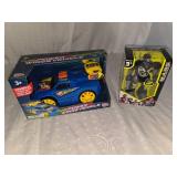 robot figure and toy car