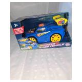 robot figure and toy car