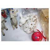 Assorted Holiday Decorations Including Santa Tin, Reindeer Figurines, and Candle Holders