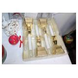 Assorted Holiday Decorations Including Santa Tin, Reindeer Figurines, and Candle Holders