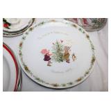 Collection of Vintage and Christmas-Themed Decorative Plates and Serveware