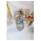 Collection of 11 Assorted Vintage Cartoon Collector Glasses