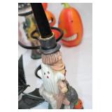 Assorted Halloween-Themed Decorative Figurines and Candle Holders
