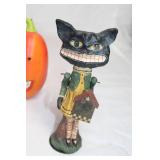 Assorted Halloween-Themed Decorative Figurines and Candle Holders