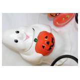 Assorted Halloween-Themed Decorative Figurines and Candle Holders