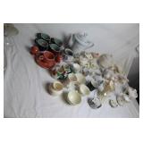 Collection of Vintage Teapots, Cups, and Serving Dishes