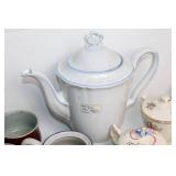 Collection of Vintage Teapots, Cups, and Serving Dishes