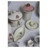 Collection of Vintage Teapots, Cups, and Serving Dishes