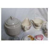 Collection of Vintage Teapots, Cups, and Serving Dishes