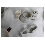 Collection of Vintage Teapots, Cups, and Serving Dishes