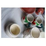 Collection of Vintage Teapots, Cups, and Serving Dishes