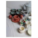 Collection of Vintage Teapots, Cups, and Serving Dishes