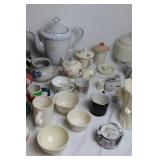 Collection of Vintage Teapots, Cups, and Serving Dishes