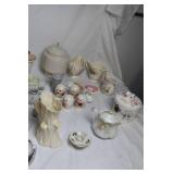 Collection of Vintage Teapots, Cups, and Serving Dishes