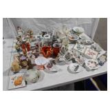 Assorted Vintage Ceramic Figurines and Decorative Plates Collection