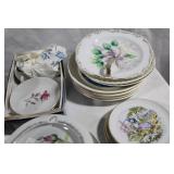 Assorted Vintage Ceramic Figurines and Decorative Plates Collection