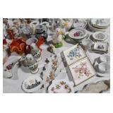 Assorted Vintage Ceramic Figurines and Decorative Plates Collection