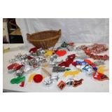Collection of Metal and Plastic Cookie Cutters with Wicker Basket