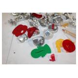 Collection of Metal and Plastic Cookie Cutters with Wicker Basket