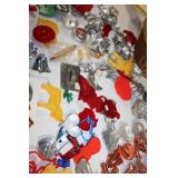 Collection of Metal and Plastic Cookie Cutters with Wicker Basket