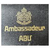 Vintage Fishing Reel Set with Cases and Accessories