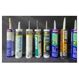 Assorted Construction and Painting Supplies with Caulking Guns