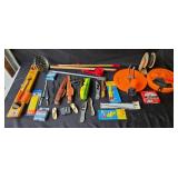Collection of Fishing Gear Including Fillet Knives and Electric Fisherman