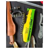 Collection of Fishing Gear Including Fillet Knives and Electric Fisherman