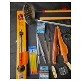 Collection of Fishing Gear Including Fillet Knives and Electric Fisherman
