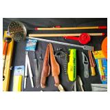 Collection of Fishing Gear Including Fillet Knives and Electric Fisherman
