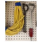 Collection of Hand Tools Including Pipe Wrenches and Claw Hammer