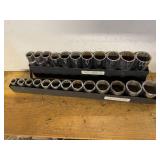 Set of Mechanics Socket Tools in Metal Racks