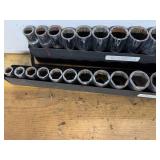 Set of Mechanics Socket Tools in Metal Racks