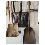 Collection of Gardening Hand Tools Including Shovels and Picks