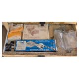 Assortment of Metal Industrial Fittings and Tools with Vise Pliers and Nibbling Tool