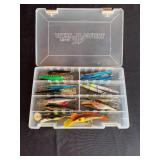 Collection of Various Fishing Lures in Tackle Box
