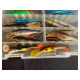 Collection of Various Fishing Lures in Tackle Box
